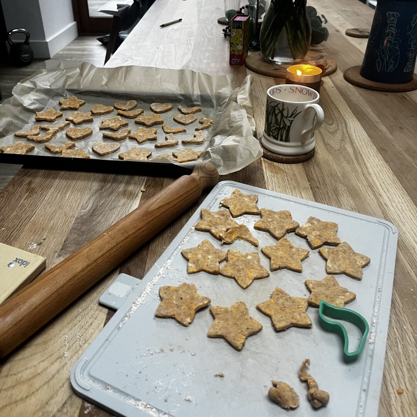 a board of cheese biscuit dough cut into star shapes
