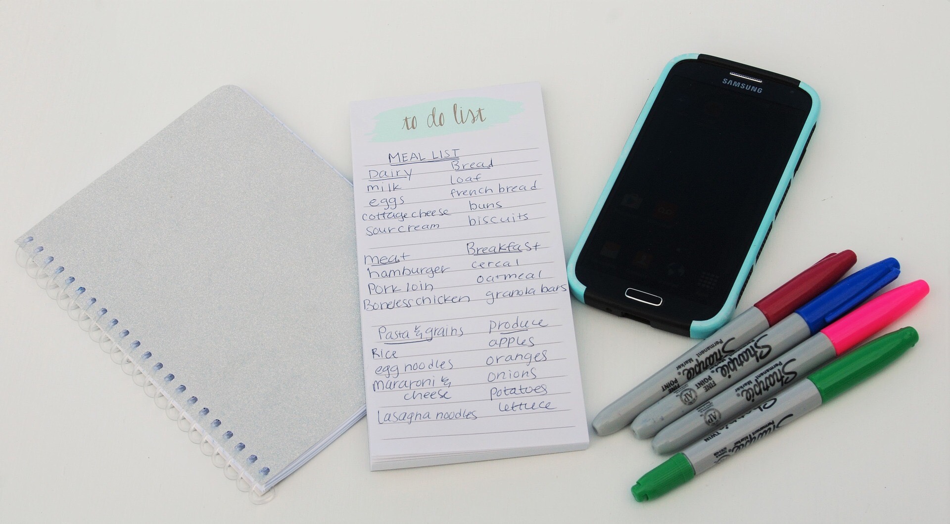 A phone, to do list and