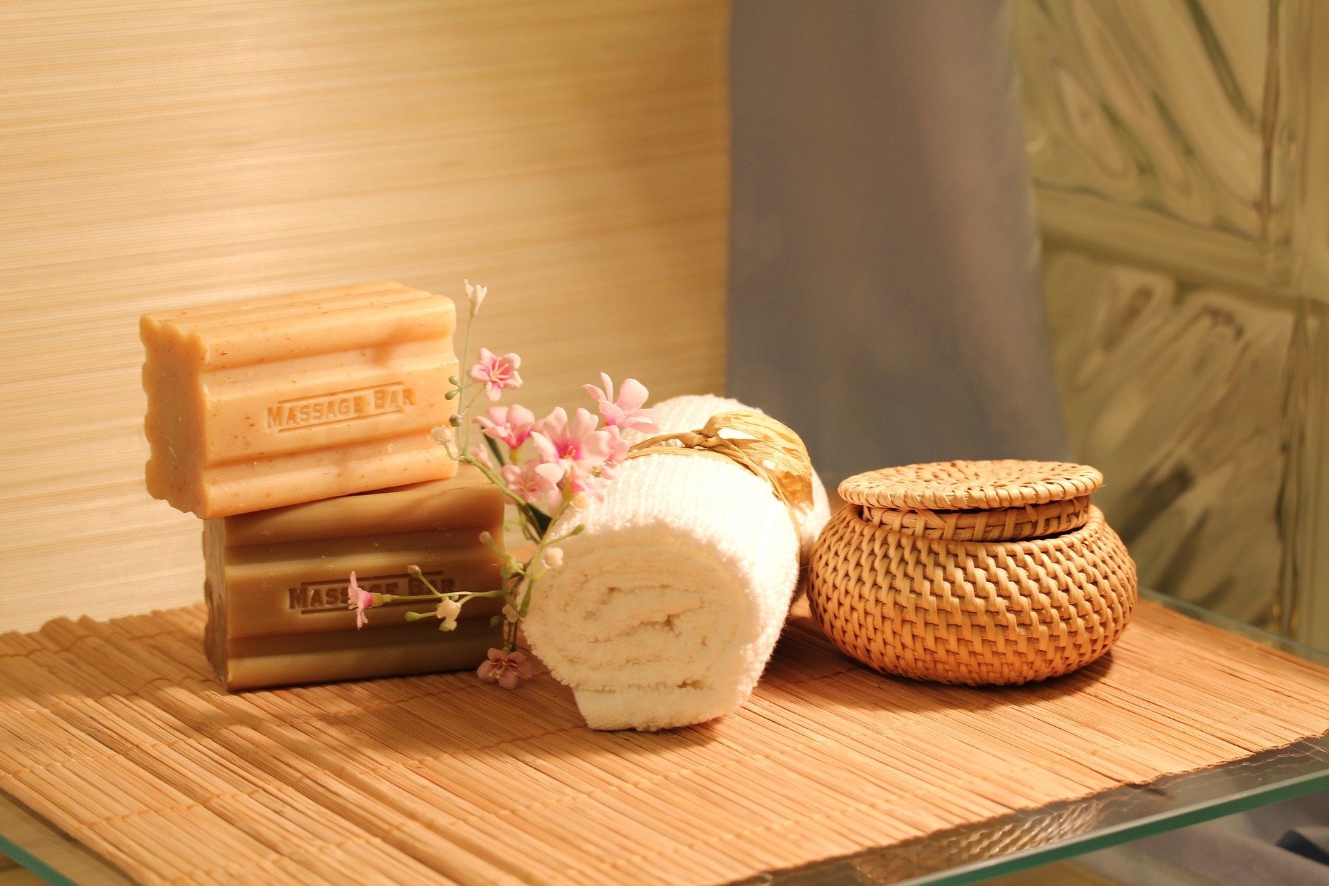 a self care picture for beating January blues. A towel and soap in a spa.