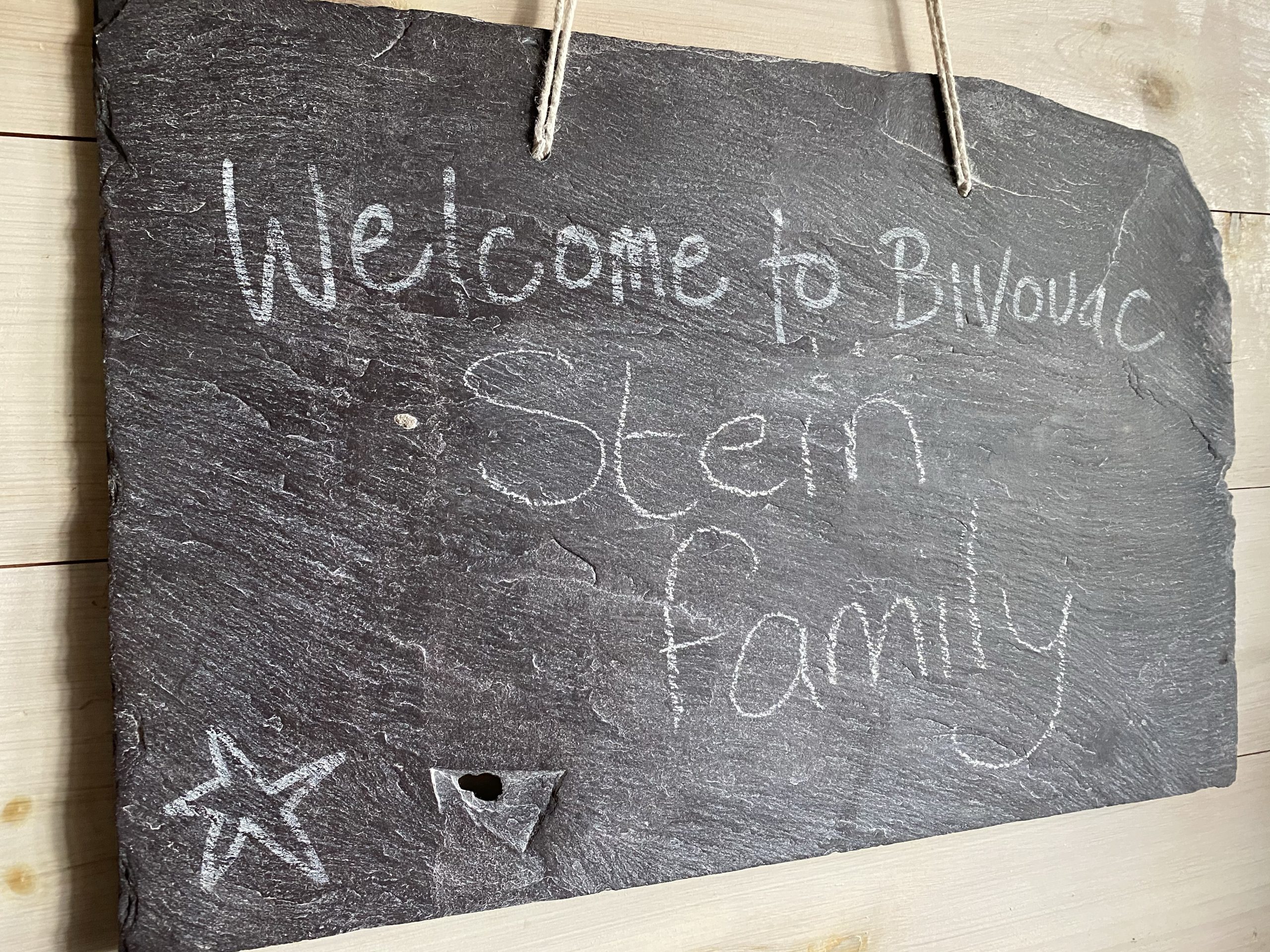 Swinton Bivouac tree lodge welcome sign 