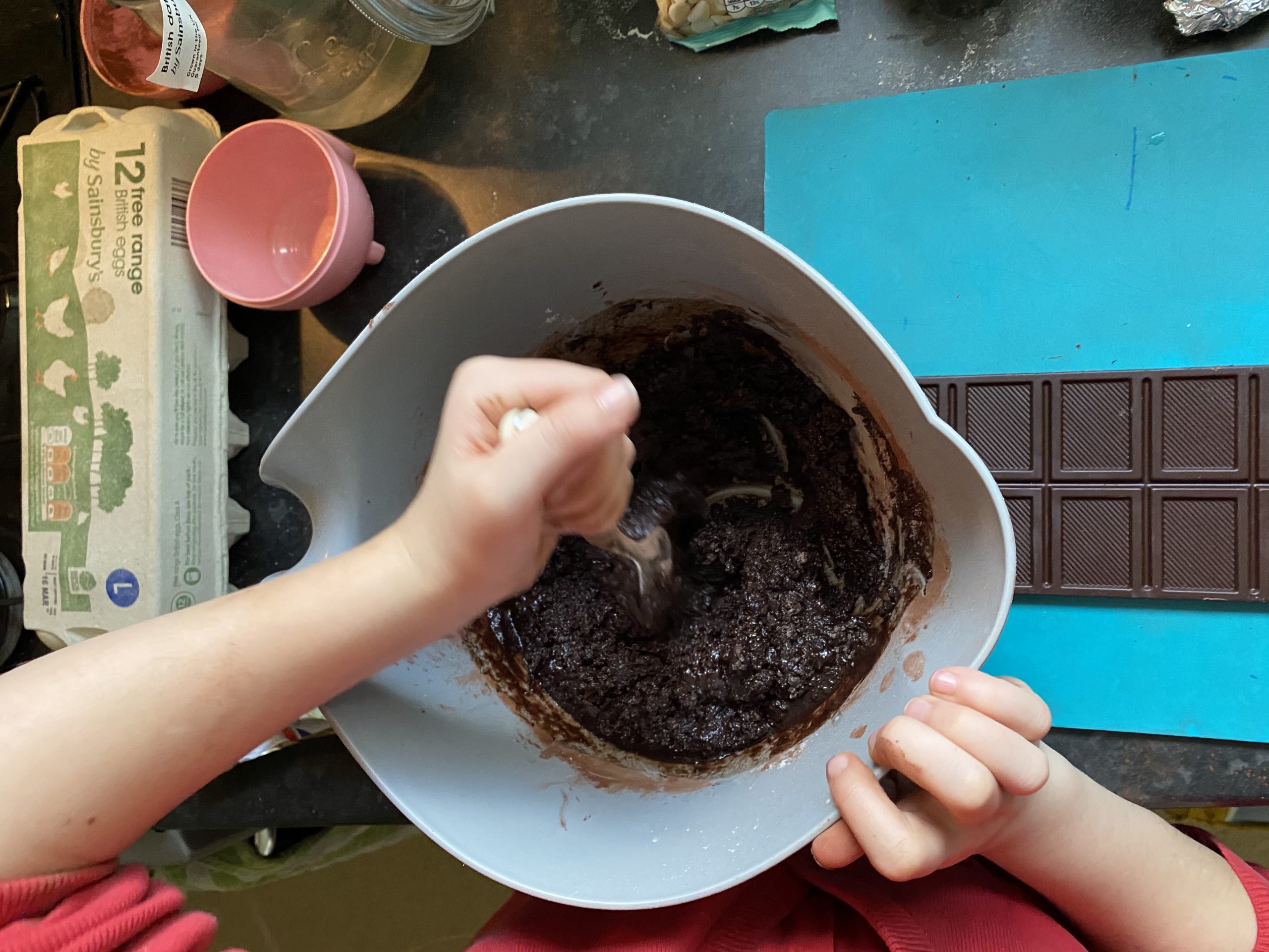 A bowl with chocolate brownie mixture