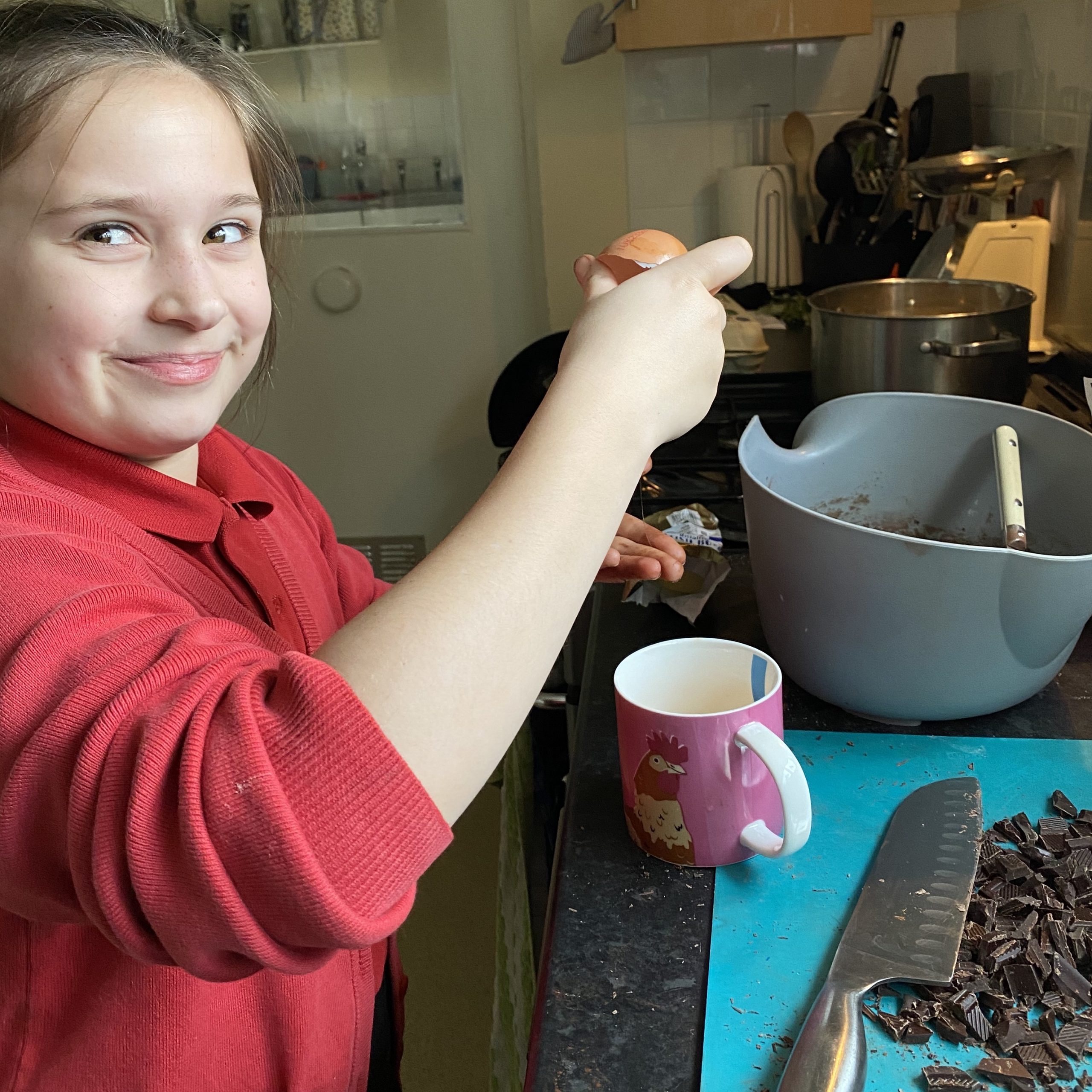 Family life with a girl baking in the kitchen
