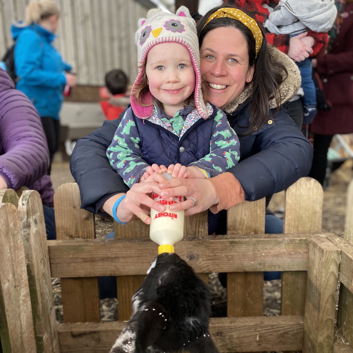 Family life this week with a photo of a Mum and daughter feeding a lamb. 