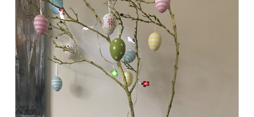 an Easter branch hung with eggs