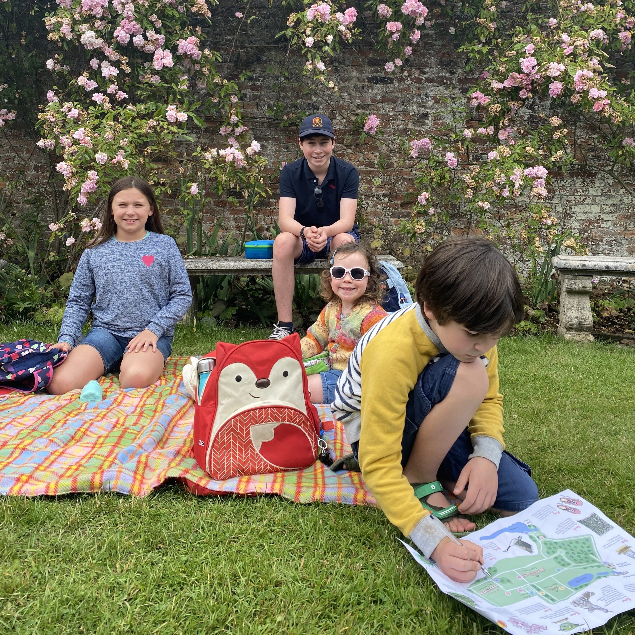 Visiting Castle Howard sat in the rose garden with four kids