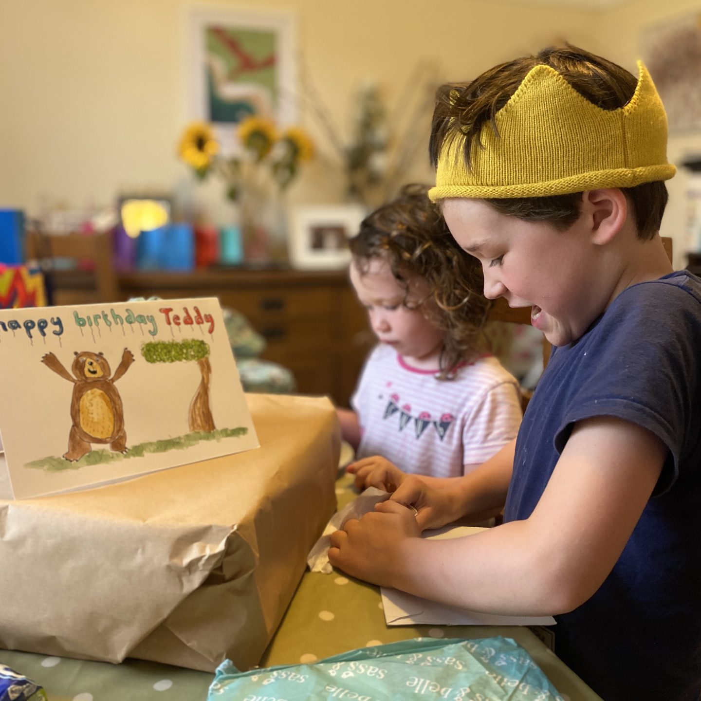 A joy opening birthday presents 
