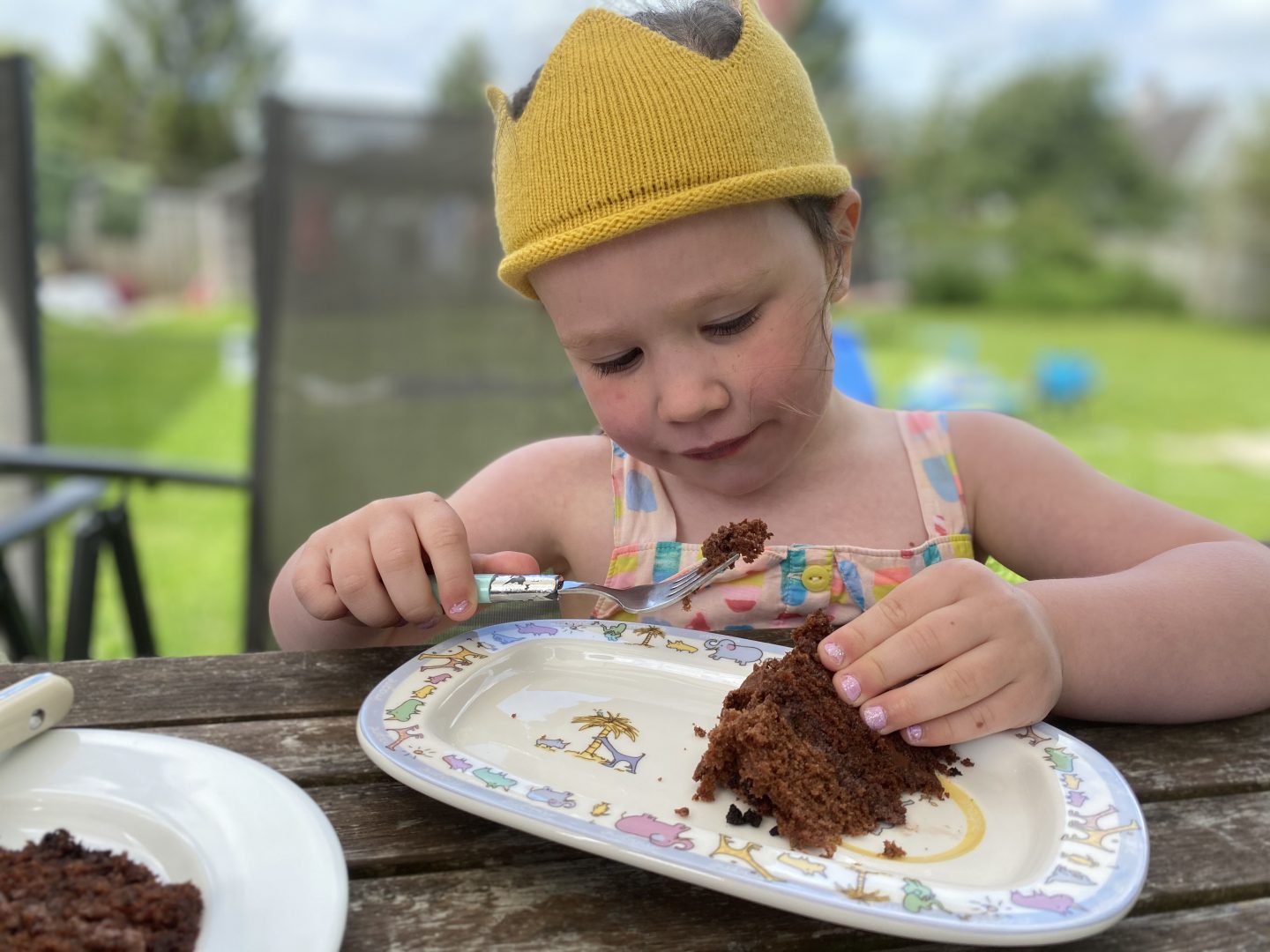 A child enjoying Birthday cake 