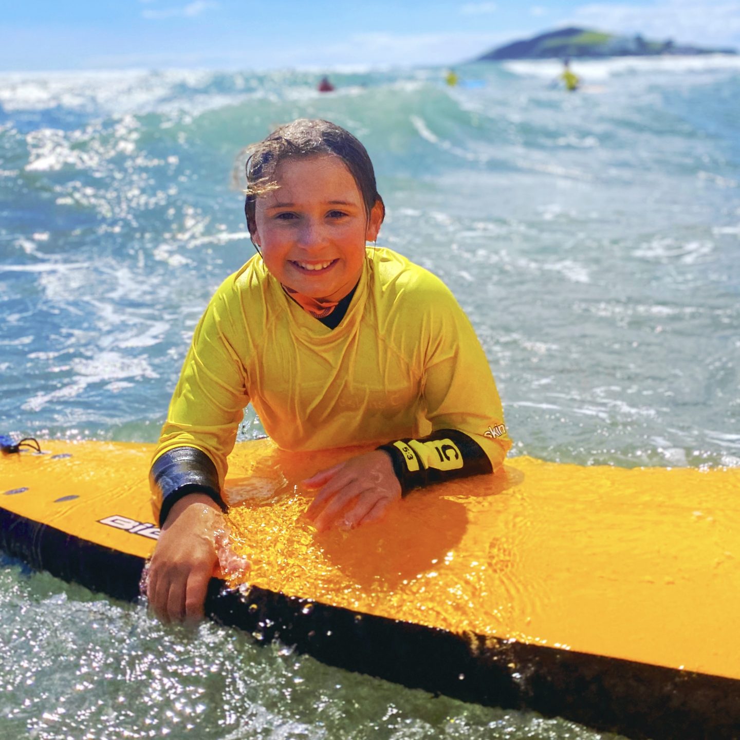 Camping in Devon and a girl surfing at Bantham beach