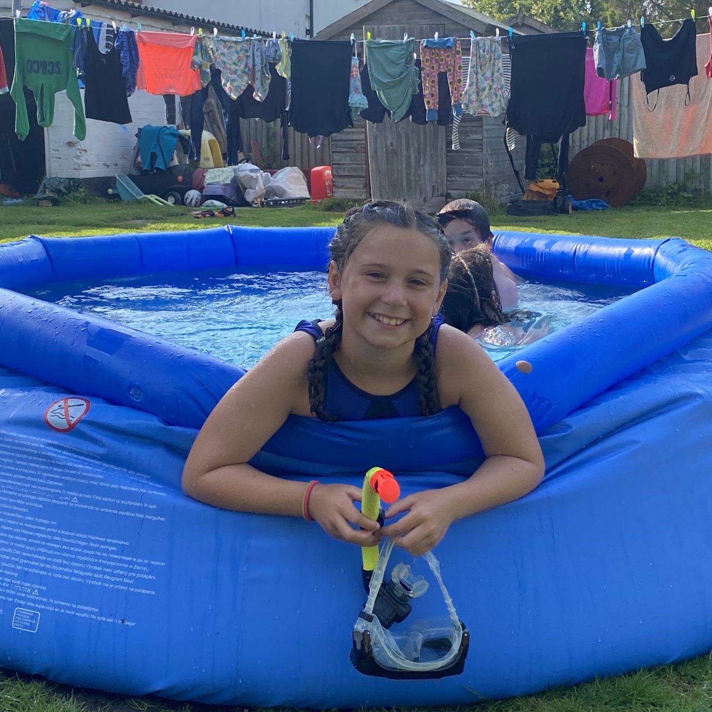 Heatwave in York with a paddling pool and a  washing line 
