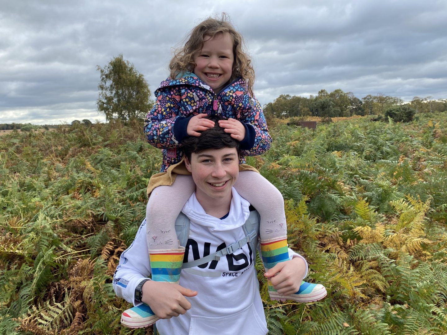 an ordinary family week with a teenager carrying his younger sister