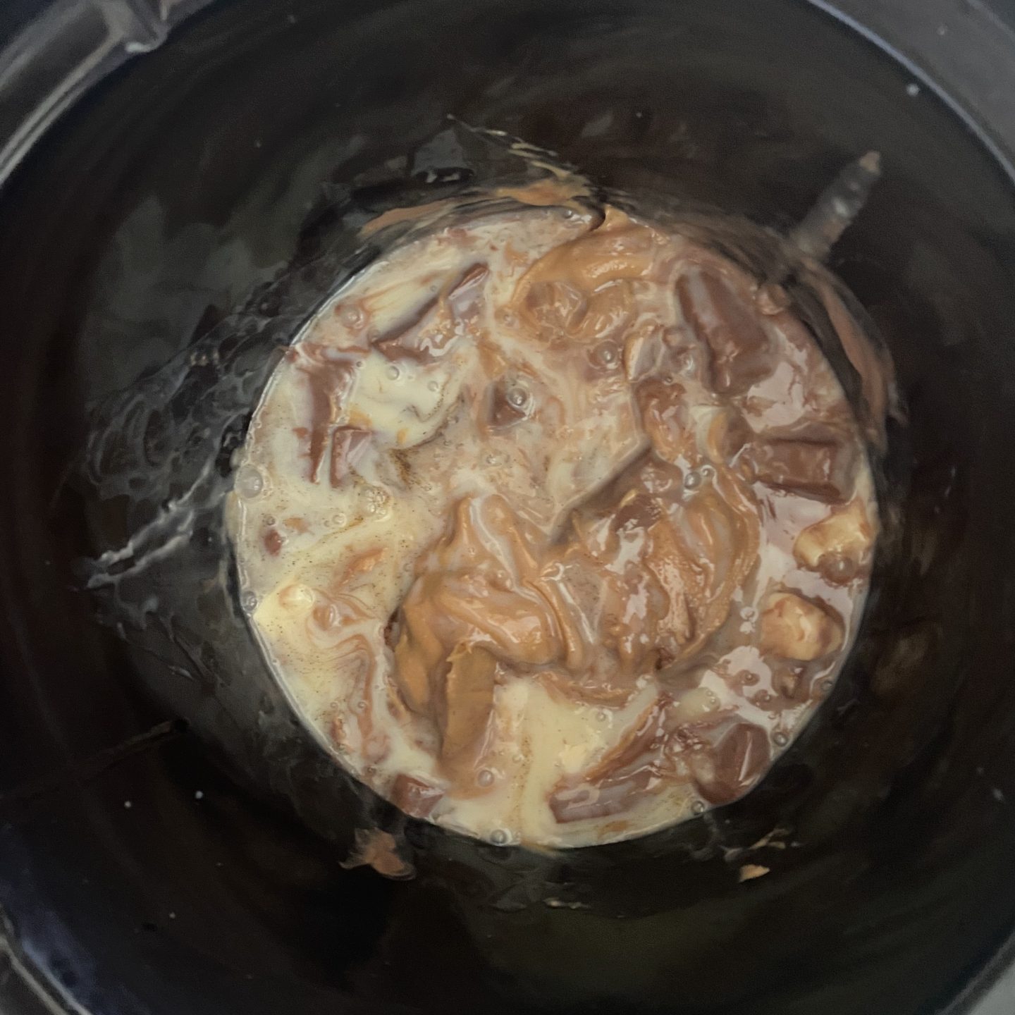 fudge mixture in a slow cooker