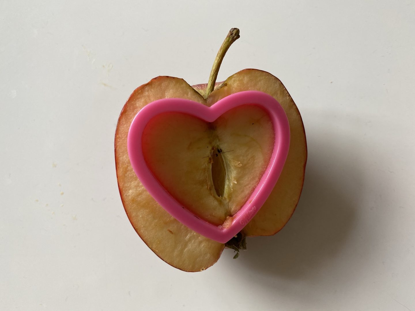 apple with a cookie cutter