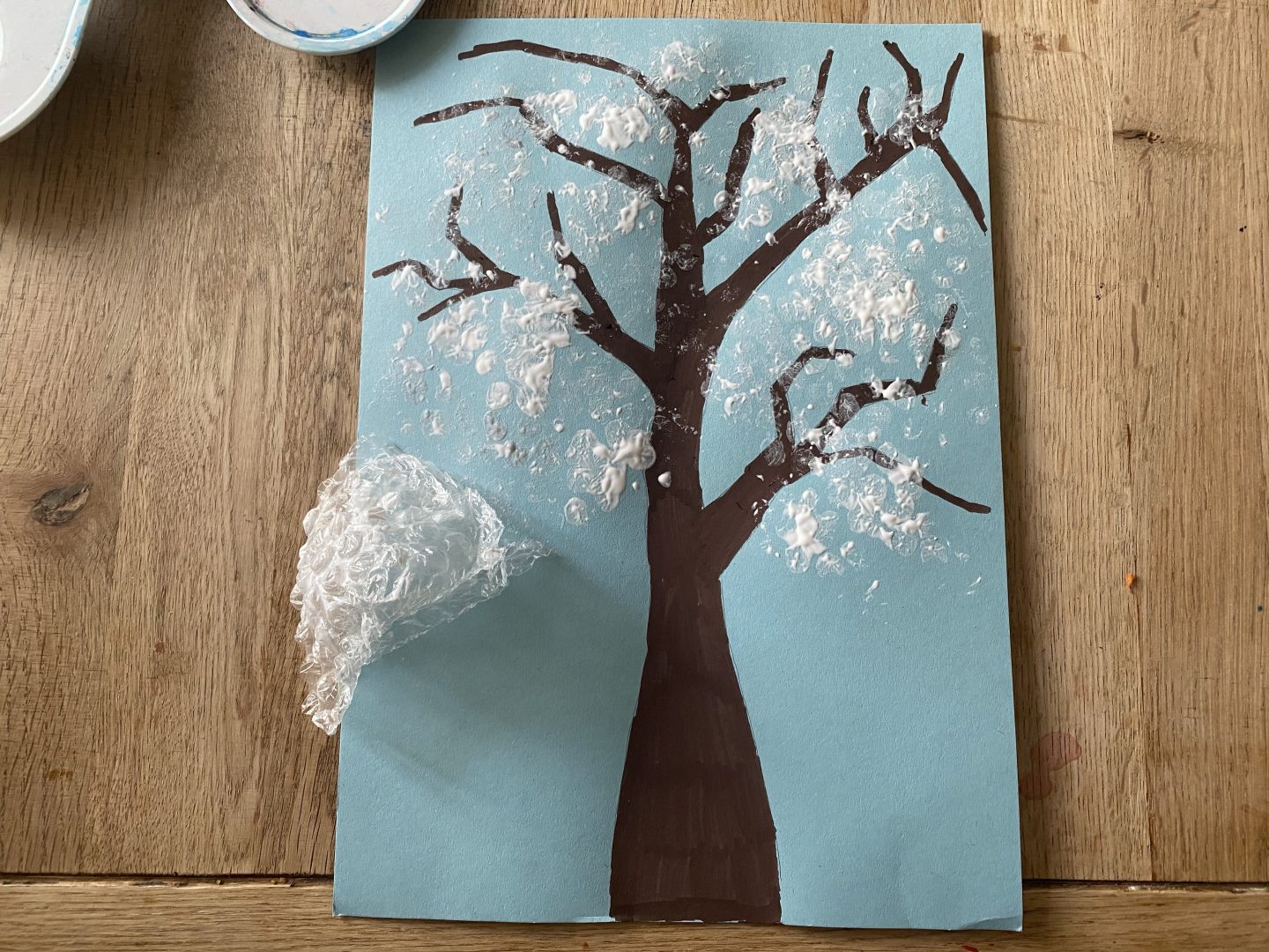a tree painted with bubble wrap and paint
