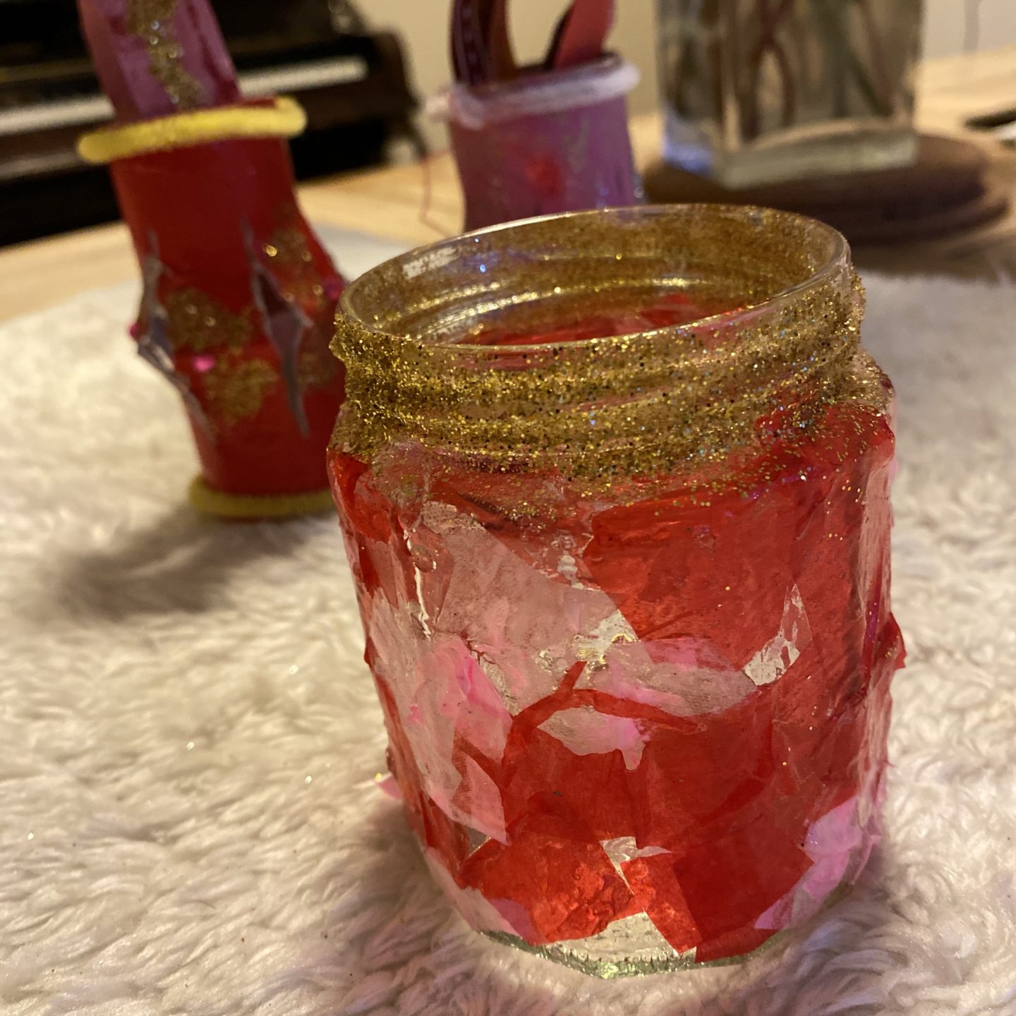 decorated jar with glitter and tissue paper 