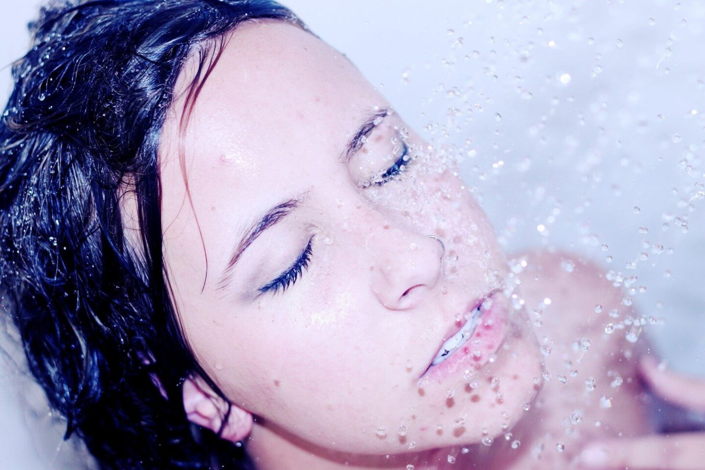 a lady in the shower - cold showers are they good for you?