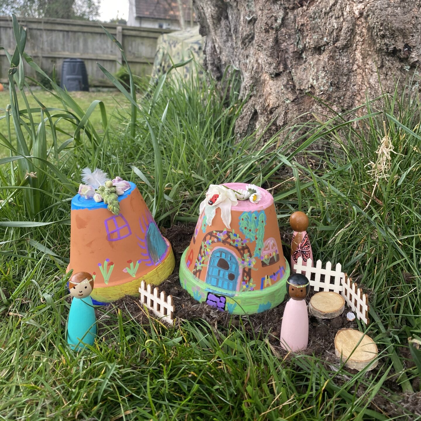 painted terracotta pot fairy houses start in the garden.