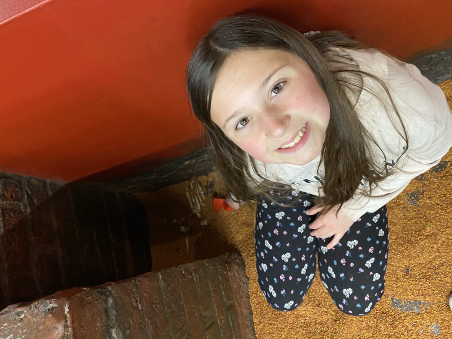 exploring York with a girl uncovering a foot at DIG museum.