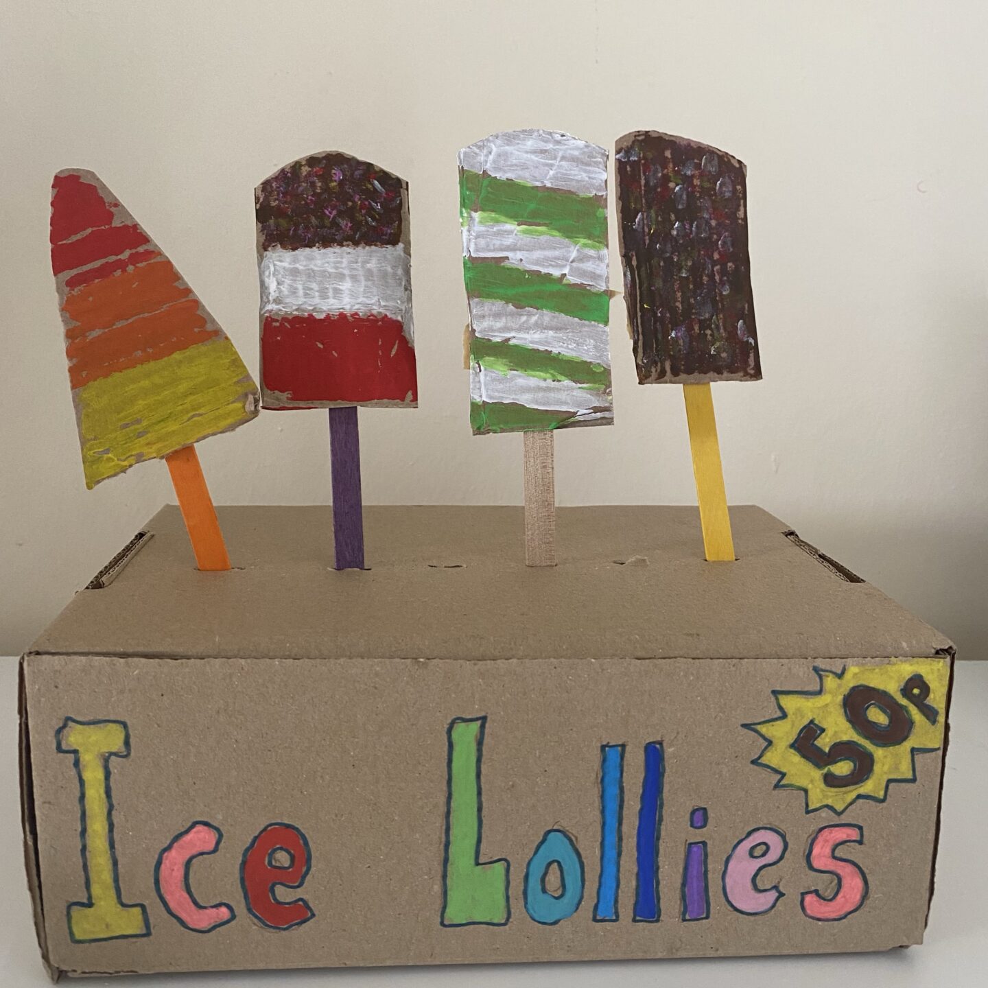 Cardboard Ice lollies on a cardboard stand