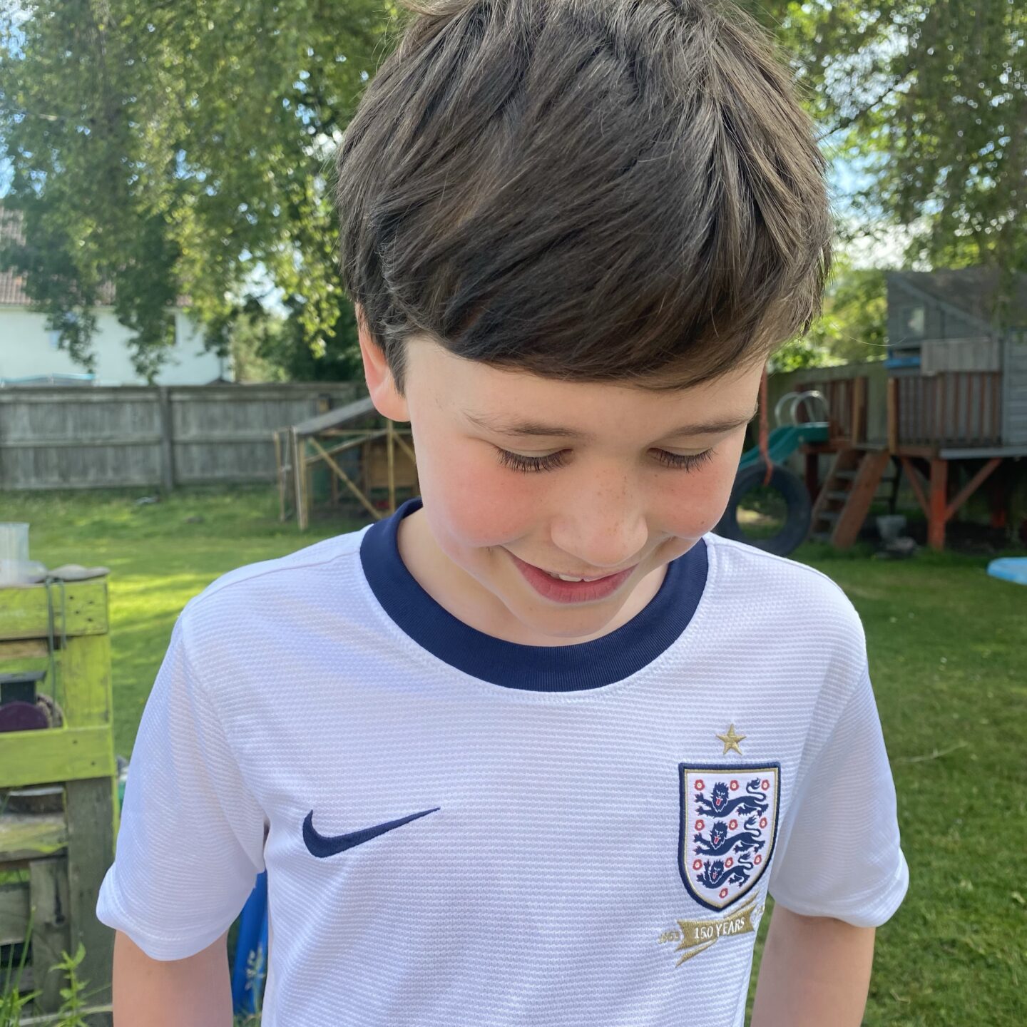 A boy in an England shirt
