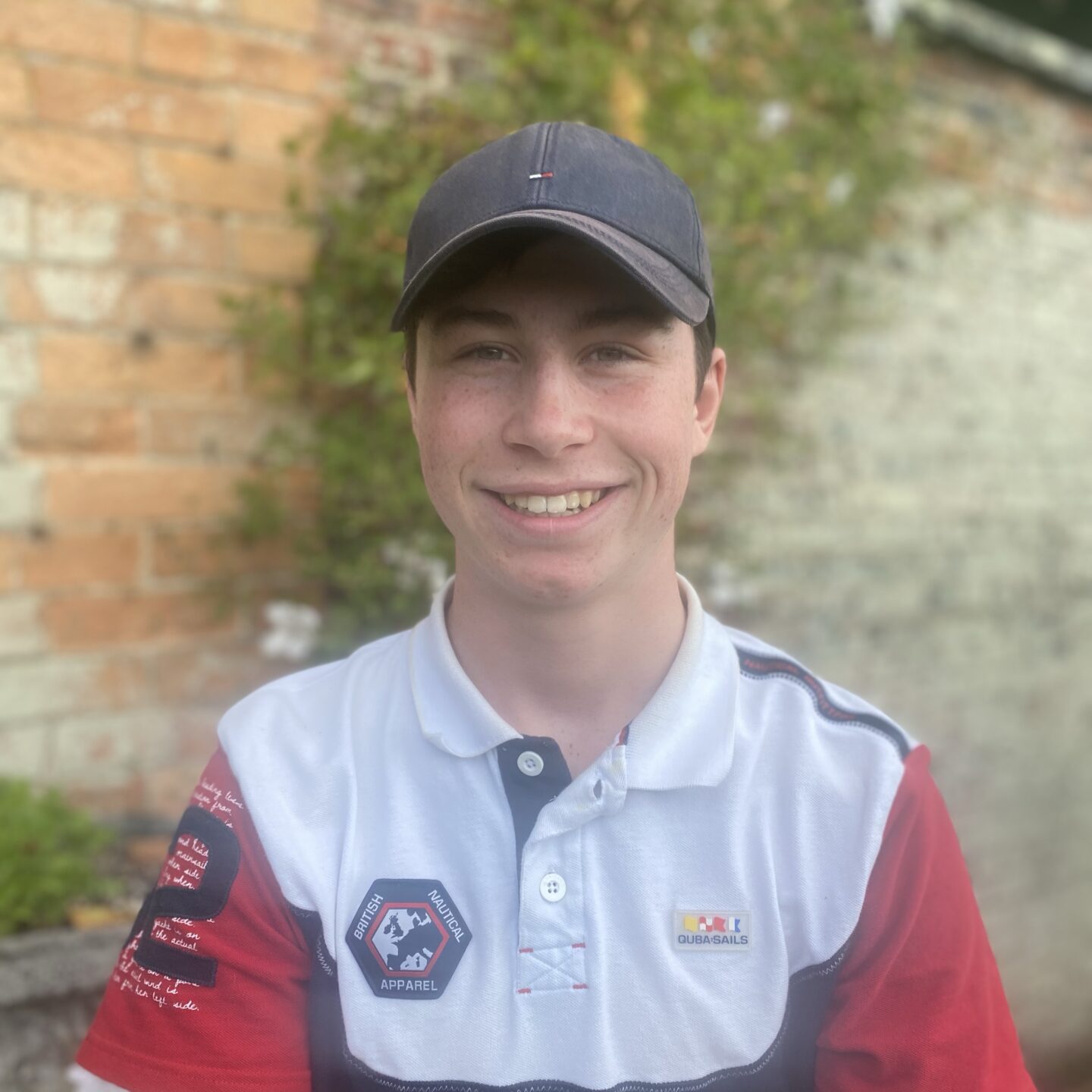 end of the summer holidays photos with a teenage boy smiling at the camera