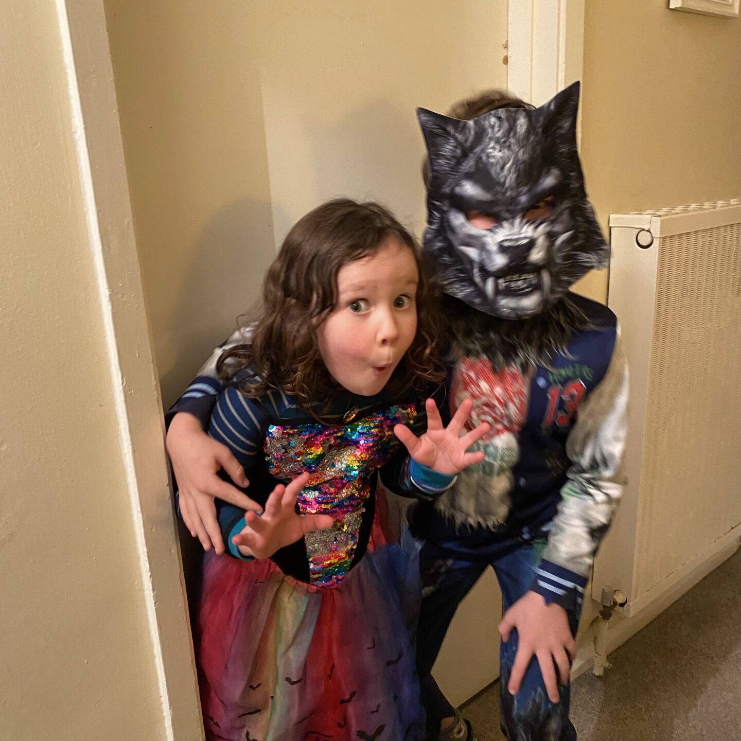 2 kids in halloween costumes