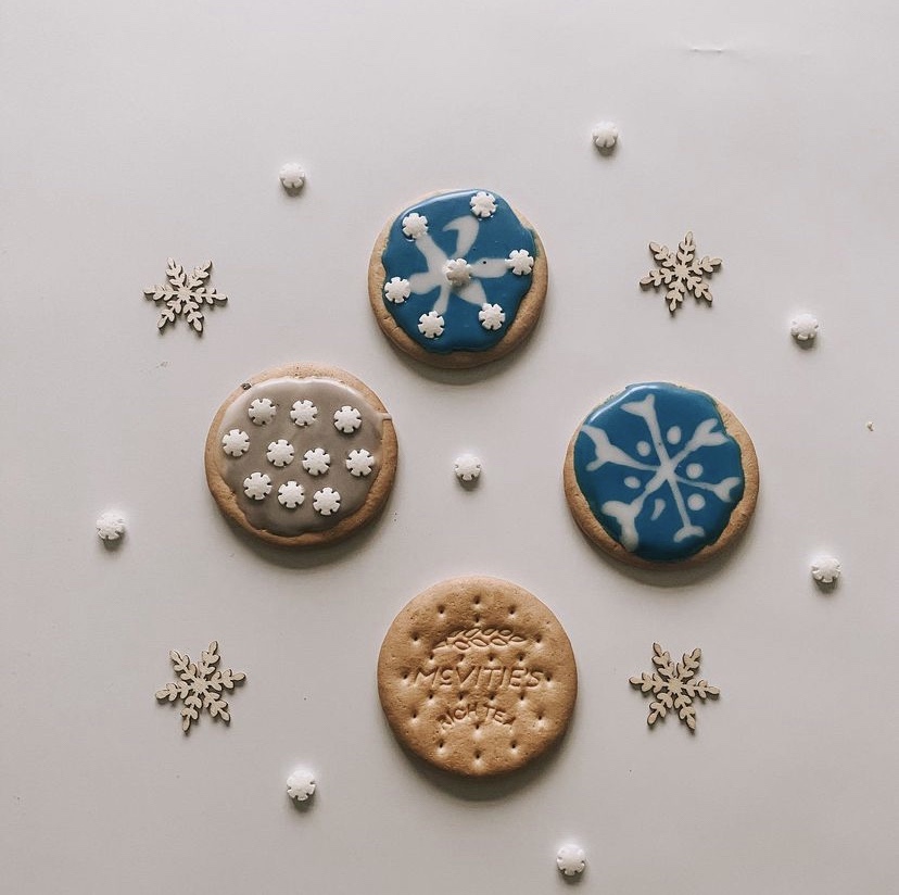 kids iced biscuits as snowflakes