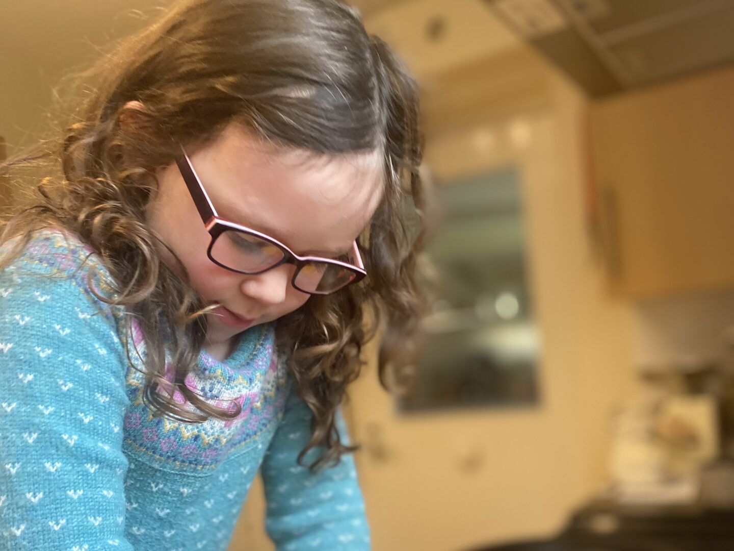 young girl in glasses 