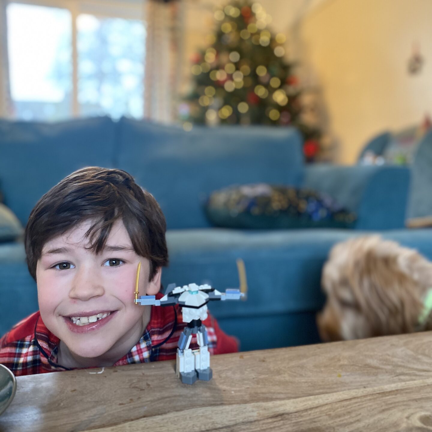 chilled christmassy weekend with a boy building Lego by the sofa 
