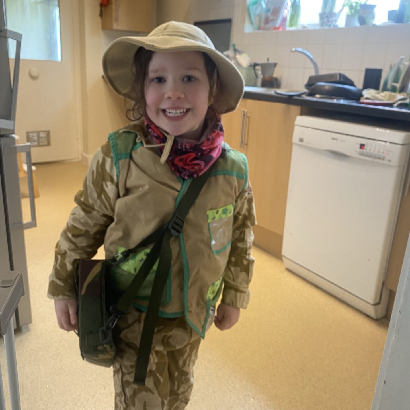 The big garden birdwatch with a young girl dressed as an explorer 