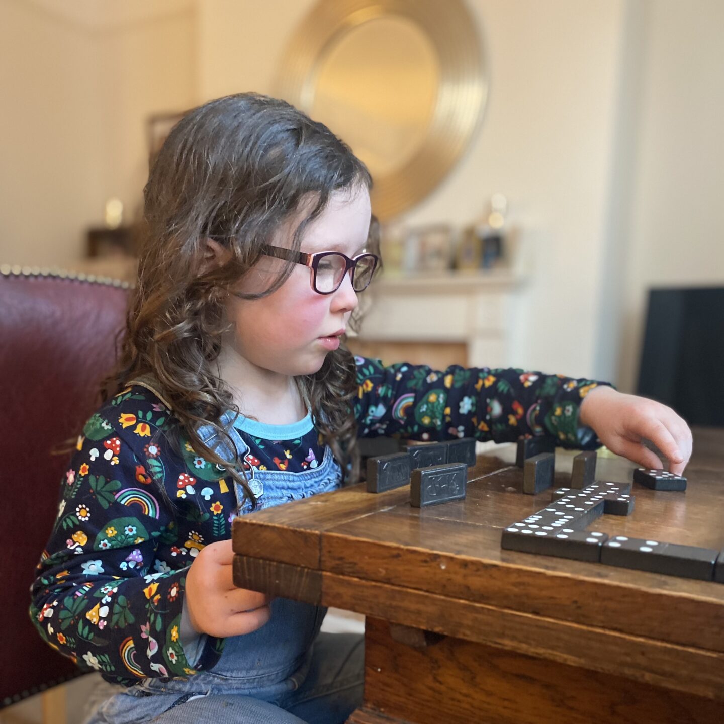 A very February weekend with a little girl playing Dominoes