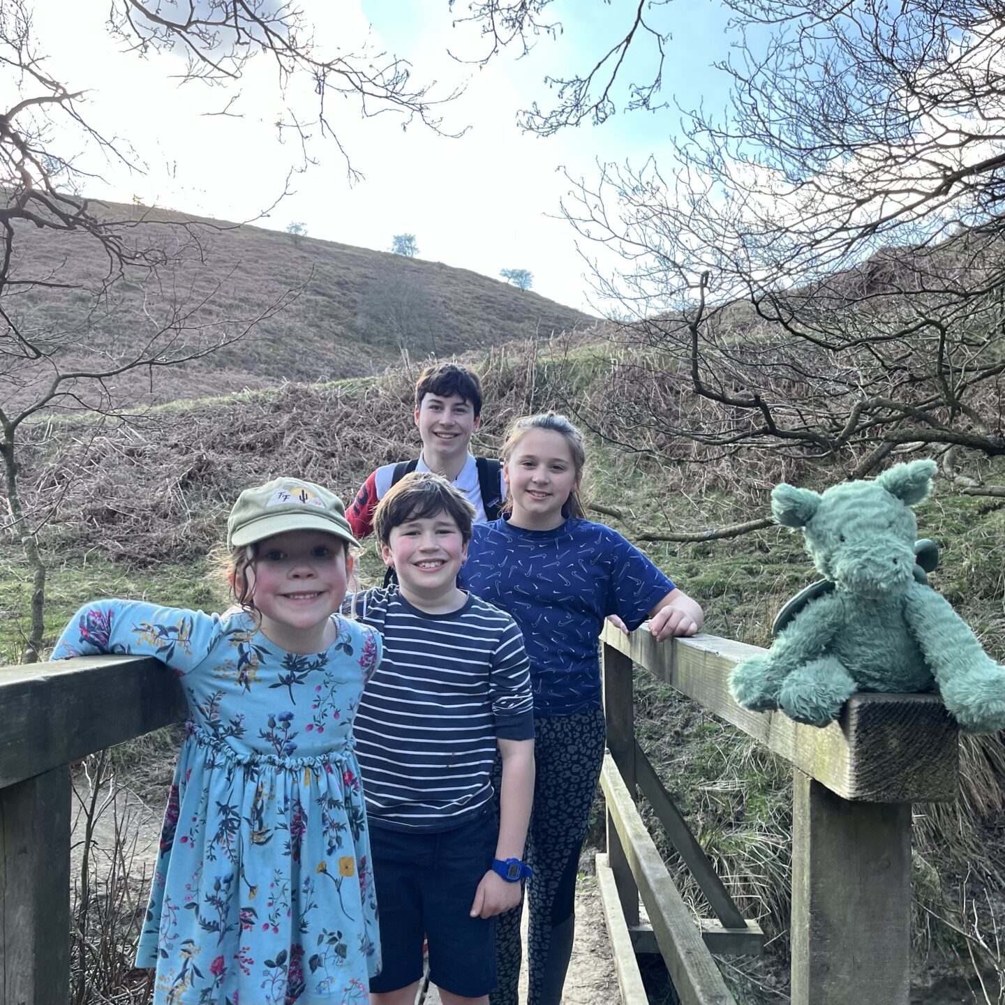 Mother's Day walk with 4 kids on a bridge