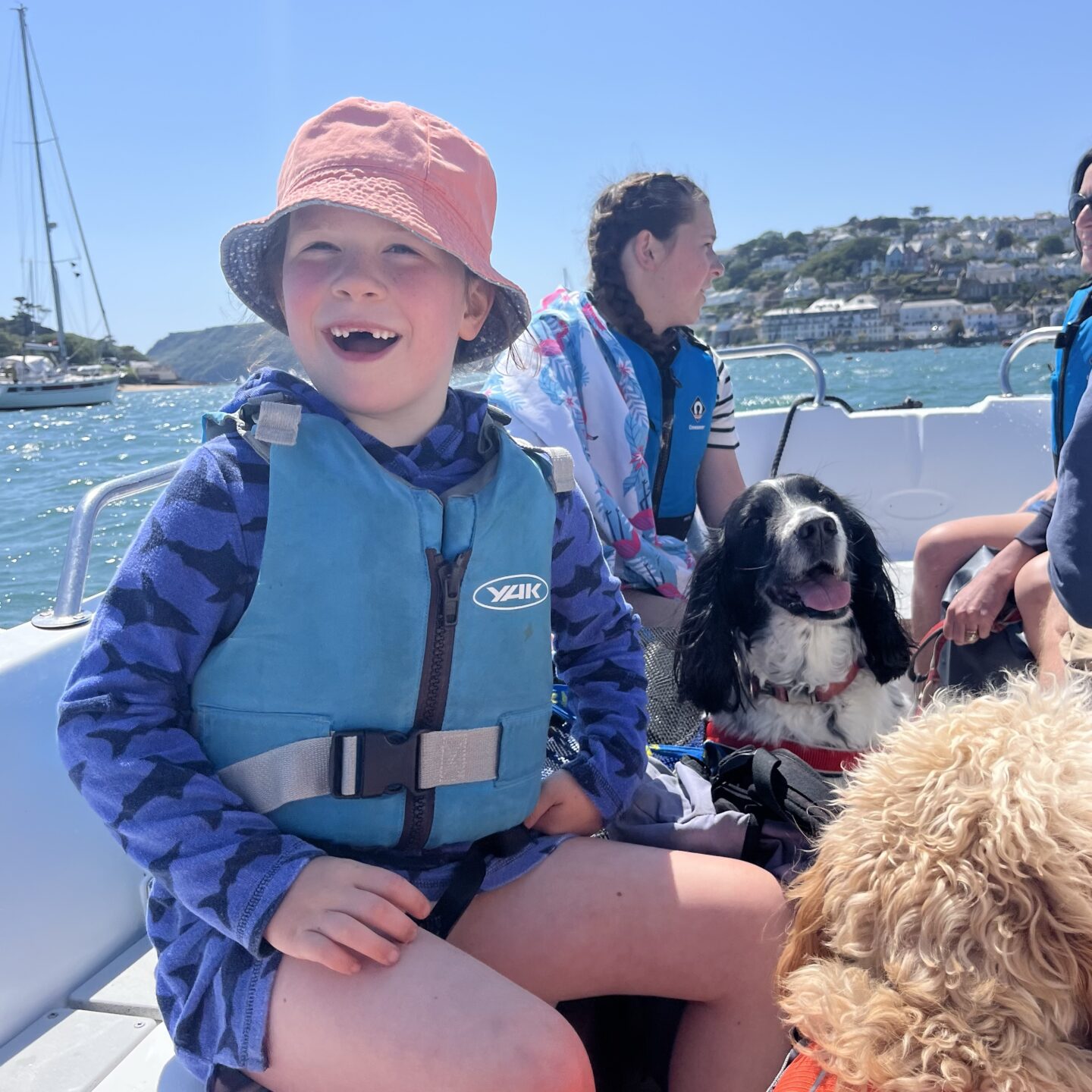 a family on a boat in Devon 