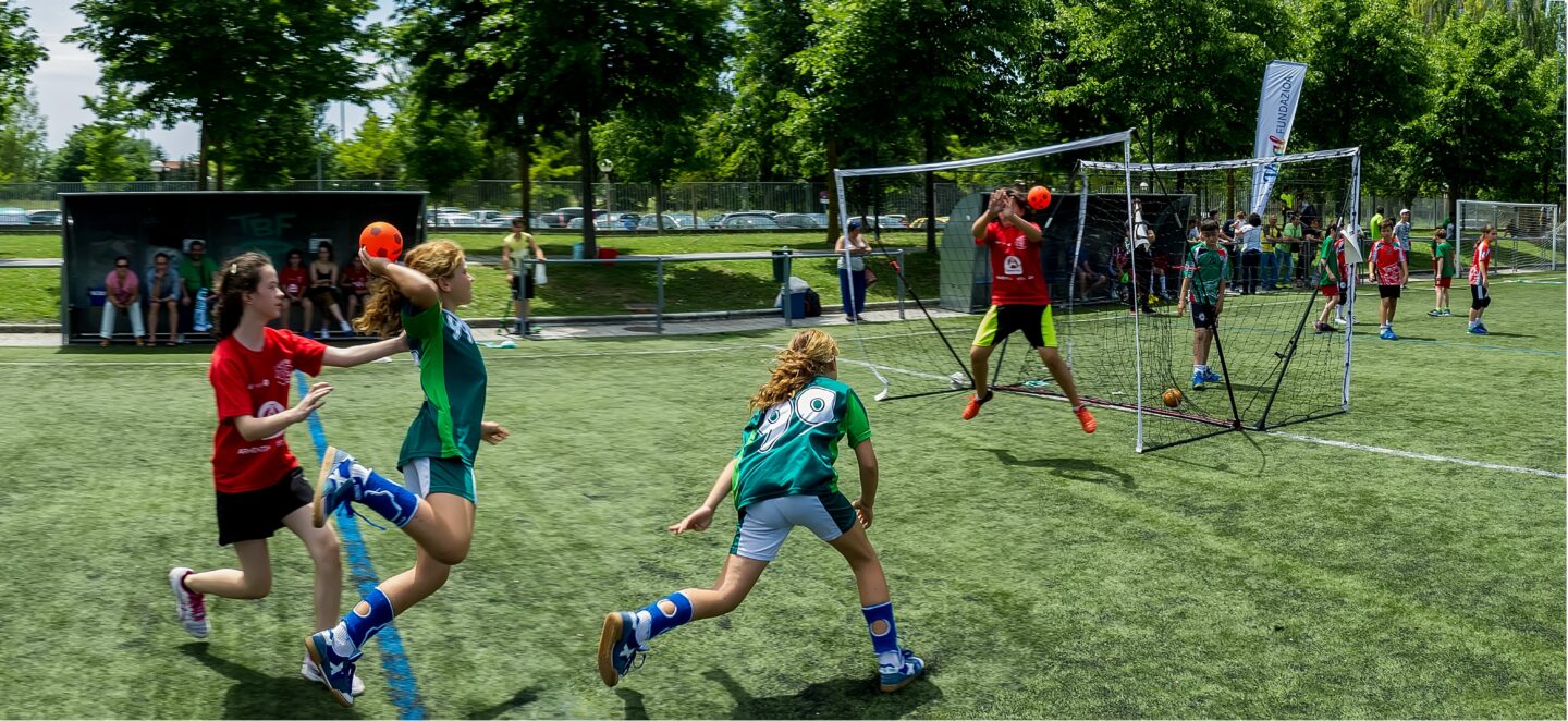 girls playing handball as they're keeping engaged over the school holidays 